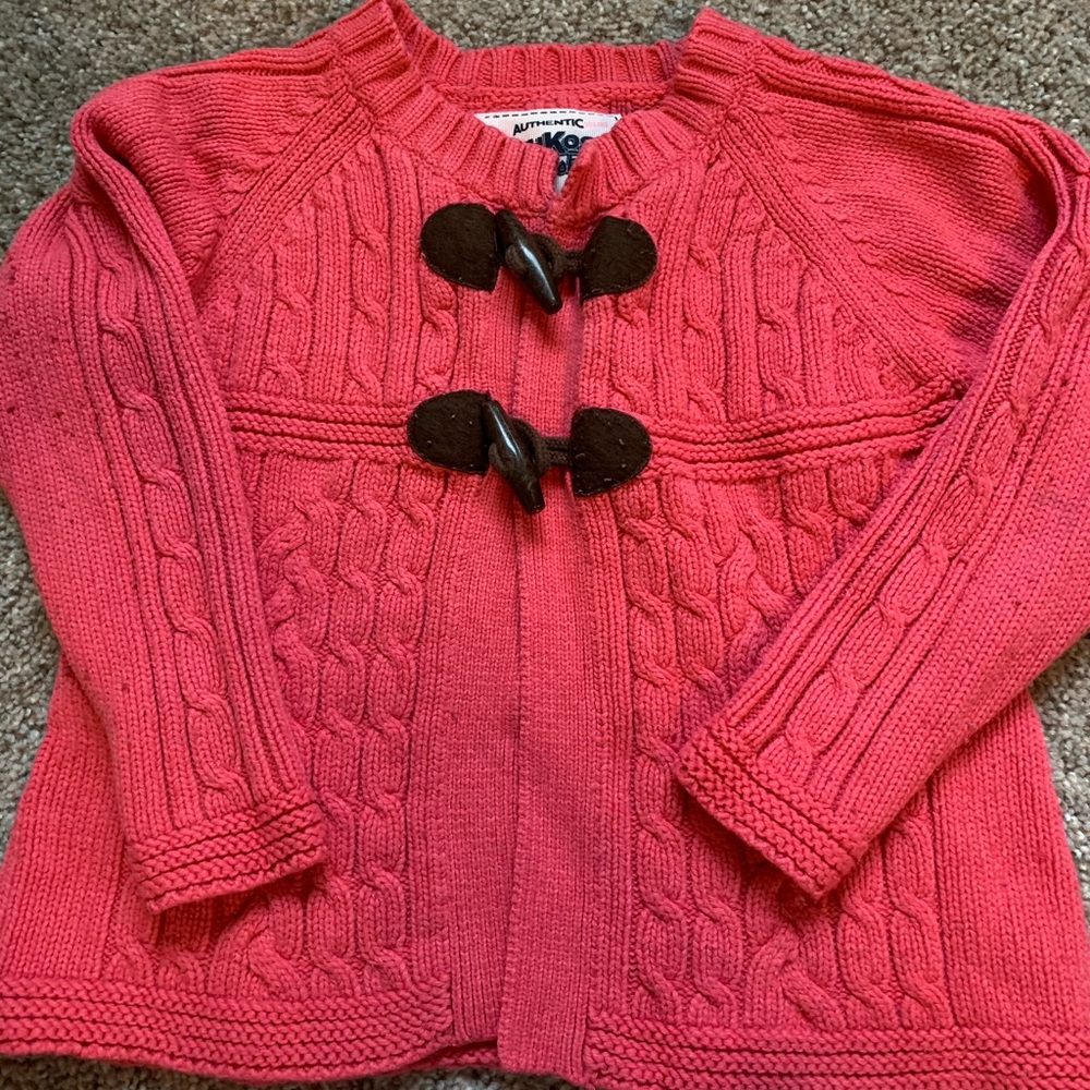 Pink cardigan sweater